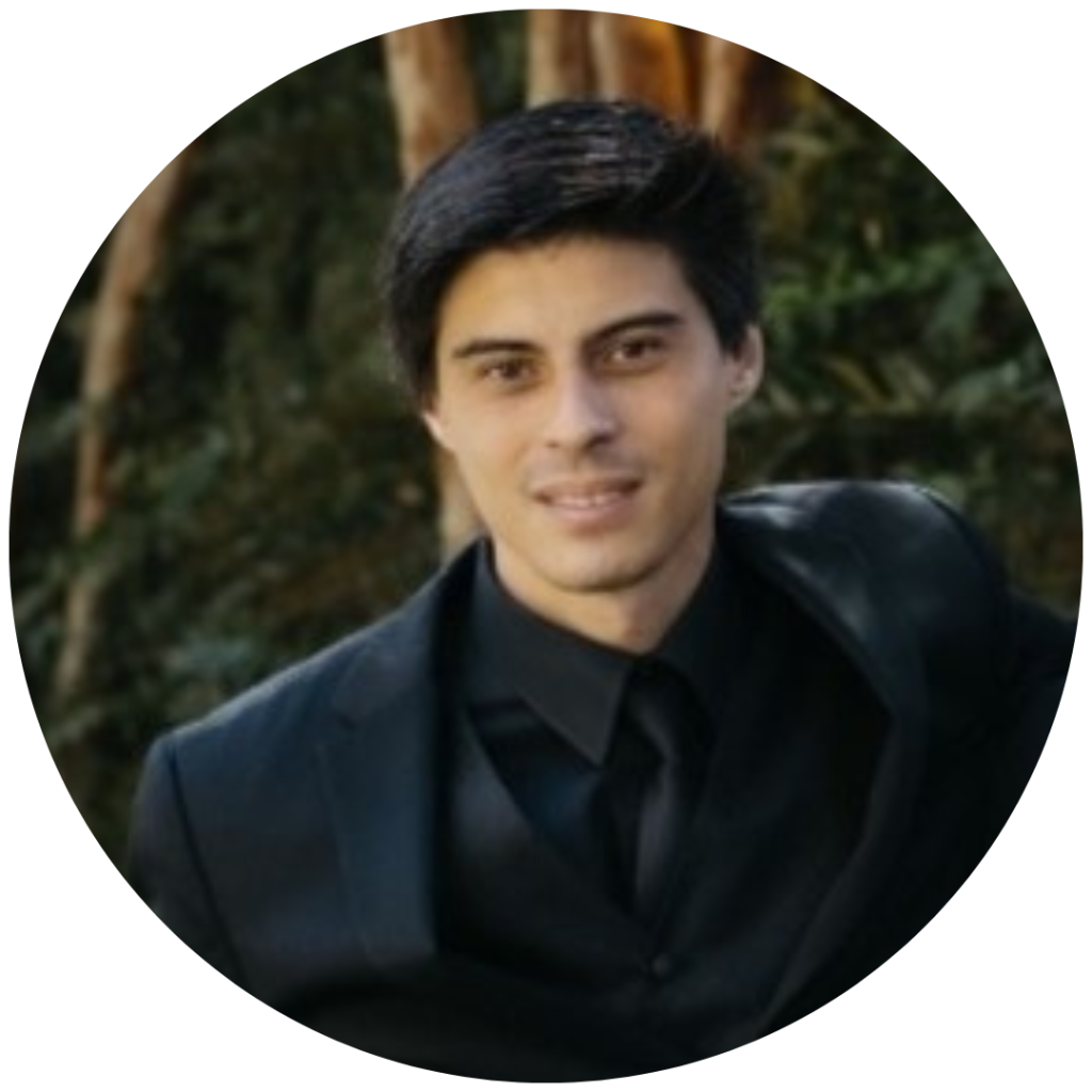 Man in a black suit outdoors