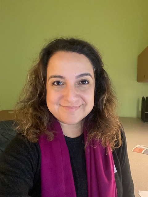 Woman smiling in an office